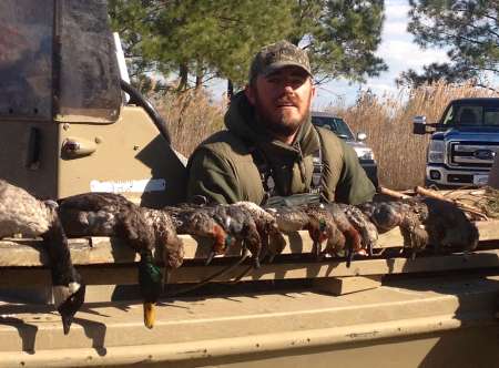 Third generation, local duck goose swan hunting guide Lake Mattamuskeet Hyde County NC Pamlico Sound. Gunner Jones Dillon Jones.